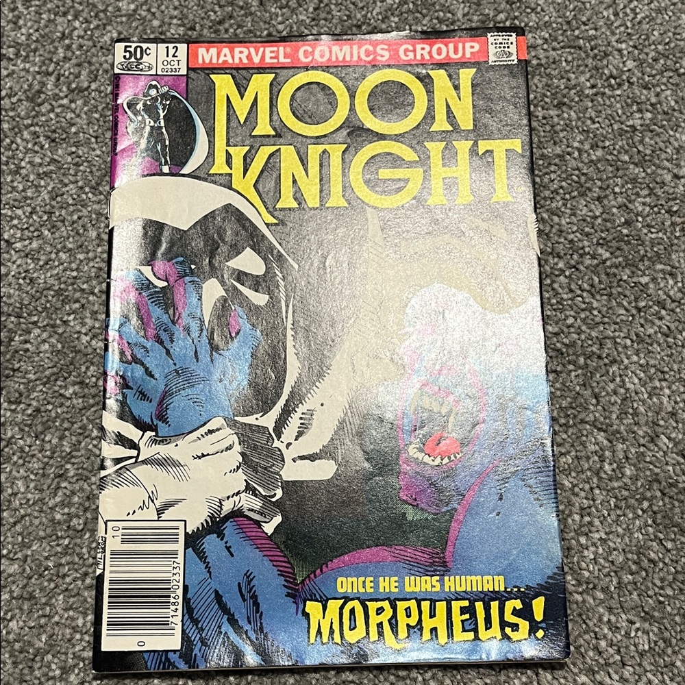 Marvel Moon Knight Comic with Black, Blue, and Yellow Cover